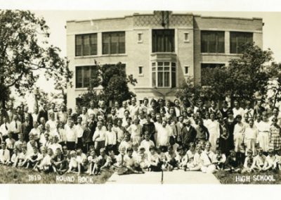 Round Rock students, 1919-1920 with original school in background