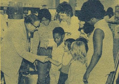 1976-77 Supt. Grisham greets students